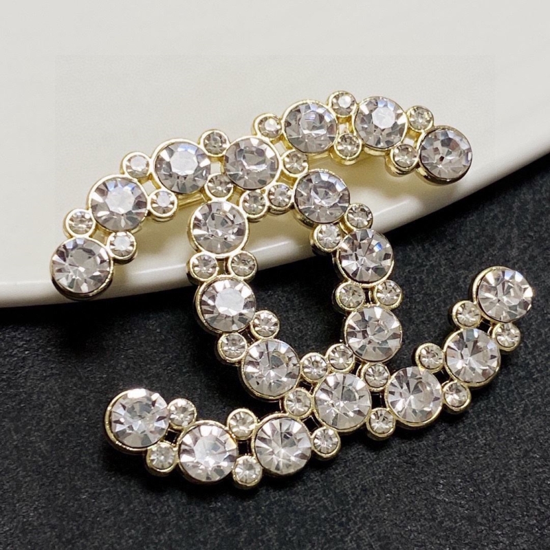 Ch**el brooches